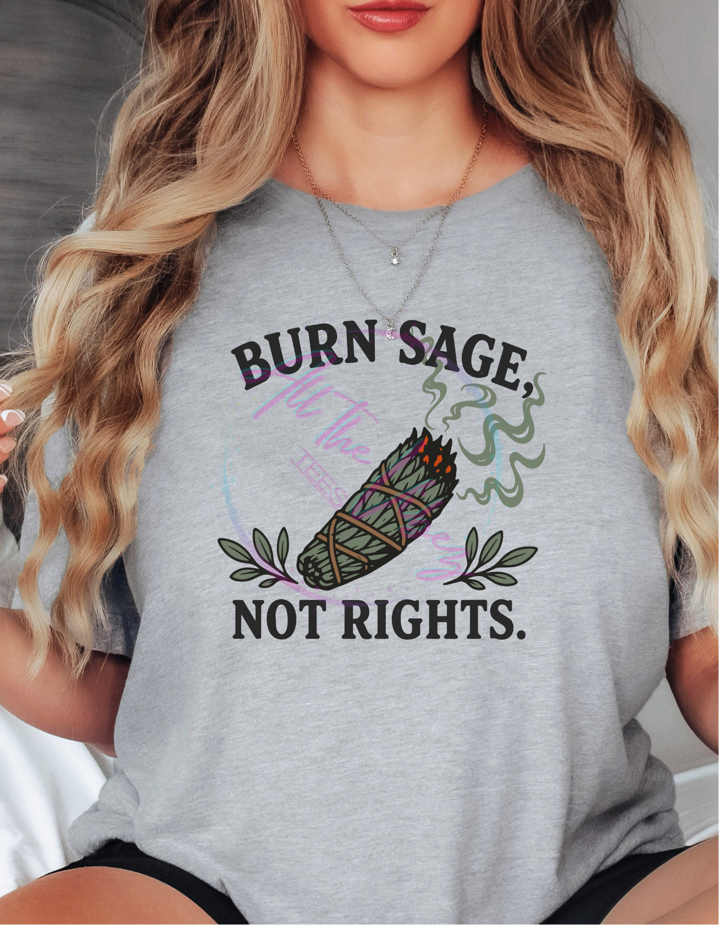 Woman wearing Burn Sage, Not Rights fall graphic tee featuring sage bundle artwork and a cozy autumn-inspired design.